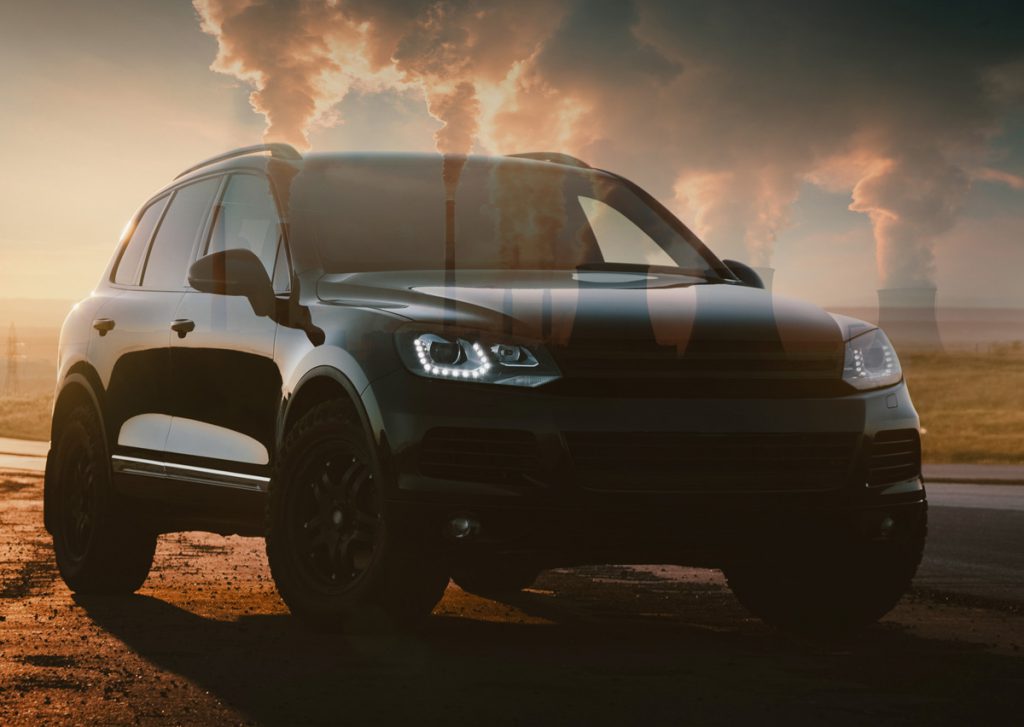 Black SUV protected by ResistAll NG2 from industrial fallout from smokestacks in a dusty environment